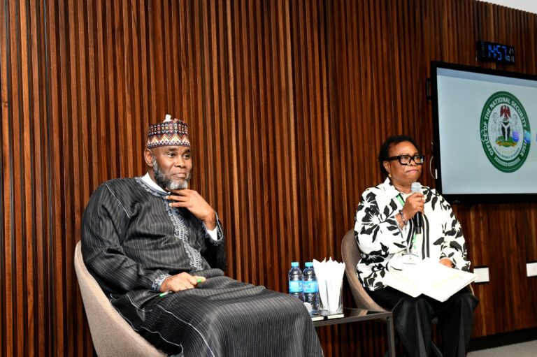 Dr. Odeka Moderator with the Keynote Speaker Amb. Mustapha Lawal, the Permanent Secretary Ministry of Foreign Affairs