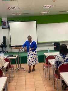 Dr Francessca Odeka Handholding Members of staff of FMSD on the use of the newly developed PMS IT solution