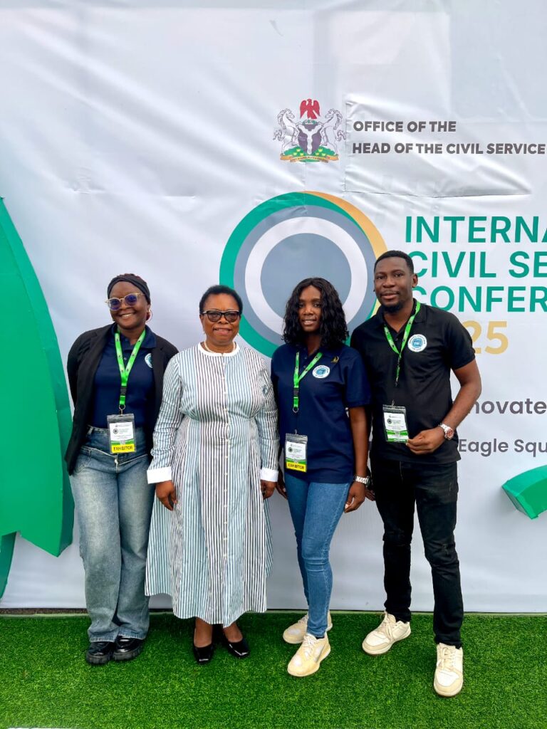 Dr Fransisca Odeka, M.D Frandek International Consulting Limited with Staff